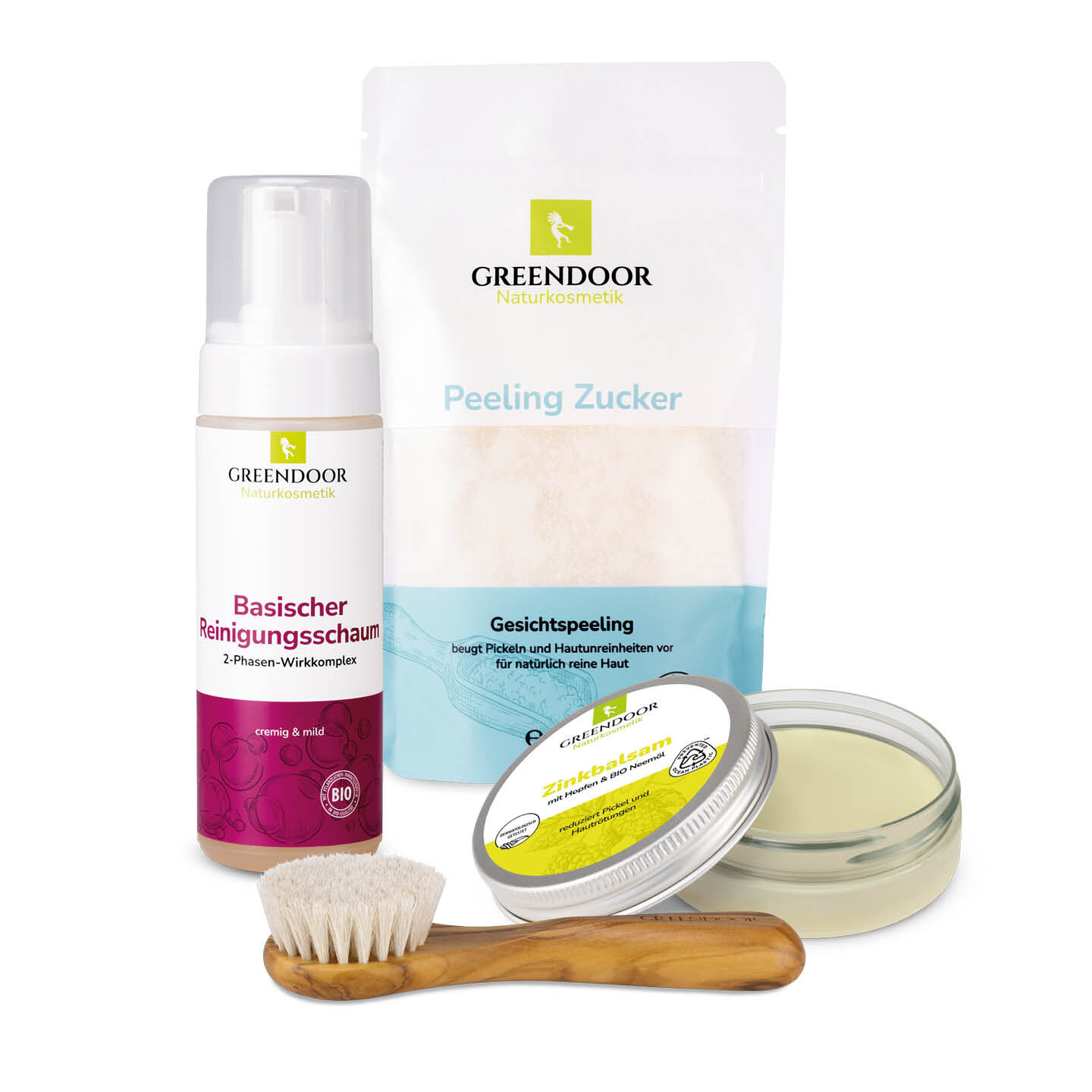 Anti Pickel Set Exclusive von Greendoor bestehend aus einem Zinkbalsam und einer Foamer Flasche Basischer Reinigungsschaum und einem Gesichtspeeling und einer Gesichtsmassagebürste